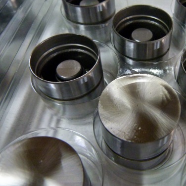 Товкач клапана, регулювальна шайба